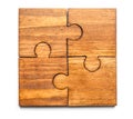 Pieces of wooden puzzle on white background Royalty Free Stock Photo