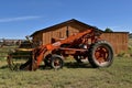 Farm M tractor with a Farmhand front end loader Royalty Free Stock Photo