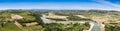 Piemontese landscape including the Tanaro river and the Alps shot from the tower of Barbaresco