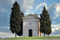 Pienza, February 2022: The famous Chapel of Vitaleta Chapel of the Madonna di Vitaleta with cloudy sky. Val d`Orcia in Tuscany. Royalty Free Stock Photo