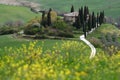 Pienza, Italy - April 16, 2021: Podere Belvedere in spring season, in the heart of the Tuscany. Val d`Orcia. Yellow rape and