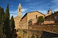 Pienza, Siena, Tuscany, Italy: cityscape of the old town with the ancient buildings and bell tower of the renaissance cathedral Royalty Free Stock Photo