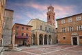 Pienza, Siena, Tuscany, Italy: the main square with the ancient city hall and the water well Royalty Free Stock Photo