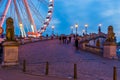 The pier in antwerp city with the view ferris wheel lighted at night, popular city architecture, Antwerpen, Belgium, April 23,