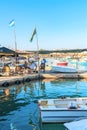 Marsaxlokk, Malta, August 2020. Fishermen rest on the pier after a hard day.