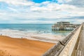 Pier on the beach of Scheveningen, North Sea, Holland, Netherlands. Royalty Free Stock Photo