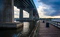 Pier and bridge over the Halifax River, Port Orange, Florida. Royalty Free Stock Photo
