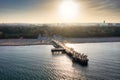 Pier in Brzezno and the beach of the Baltic Sea at sunset, Gdansk. Poland Royalty Free Stock Photo