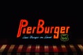 Pier Burger neon sign at night, on the Santa Monica Pier in Los Angeles, California