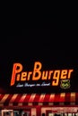 Pier Burger neon sign at night, on the Santa Monica Pier in Los Angeles, California