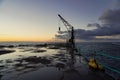 Pier and crane in the Fishing Village of El Pris Royalty Free Stock Photo