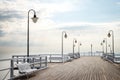 Pier with empty benches in Gdynia Orlowo, Poland Royalty Free Stock Photo