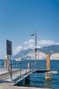 Pier for ferry service on the shore of Lake Garda in Malcesine in Italy Royalty Free Stock Photo