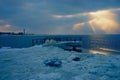 Pier frozen in ice in the river in winter Royalty Free Stock Photo