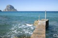 Pier at Hort Cove and Beach with Vedra Island; Ibiza Royalty Free Stock Photo