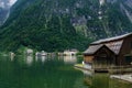 Pier and house on the Hallstaettersee lake. Hallstatt, Salzkammergut region, Austria Royalty Free Stock Photo