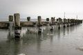 Pier with icicles at the baltic sea coast Royalty Free Stock Photo