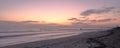 Pier/jetty, playa de muro, sunrise over mountains on secluded beach, alcudia, mallorca, spain Royalty Free Stock Photo