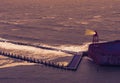 The pier jetty of Vlissingen with lighted lighthouse, Sea landscape at night, Zeeland, The Netherlands Royalty Free Stock Photo