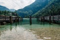 Pier in Konigssee lake a sunny summer day