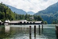 Pier in Konigssee lake a sunny summer day