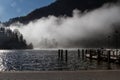 The pier of KÃÂ¶nigssee in Bavaria, Germany, in morning fog