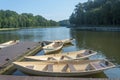 Pier on the lake with boats for walking on the water. Selective focus Royalty Free Stock Photo