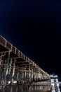 Twinkling stars over beach pier