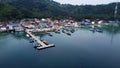 Pier with at Lampung Sea Pahawang Beach, located near the Sumatera city aerial drone. Resort Pahawang With a clouds on the Sky in