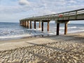 Pier in late afternoon at St. Augustine Beach Royalty Free Stock Photo