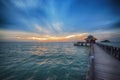 Pier leading into beautiful sunrise Royalty Free Stock Photo