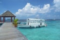 Pier leading to passenger boats at maldive