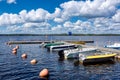 Pier with motor boats on the lake Royalty Free Stock Photo