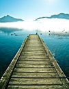 Pier by mountain lake Mondsee in Autria Royalty Free Stock Photo