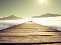 Pier by mountain lake Mondsee in Autria Royalty Free Stock Photo