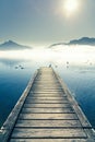 Pier by mountain lake Mondsee in Autria Royalty Free Stock Photo