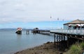 Pier at Mumbles hills. Royalty Free Stock Photo