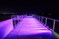 Pier at night, with purple lighting Royalty Free Stock Photo
