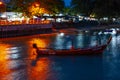 Pier at night with yellow lights on a background of blue sky Royalty Free Stock Photo