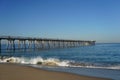 Pier on the ocean in the morning sun Royalty Free Stock Photo