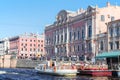 Pier pleasure tourist boats on the Fontanka River near Beloselsky-Belozersky Palace in St. Petersburg