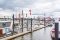 Pier of the port of Hamburg harbor on the river Elbe in Hamburg, Germany Royalty Free Stock Photo