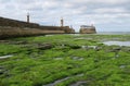 Pier of port of Whitby with lightouse