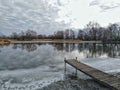 Pier on the river in autumn