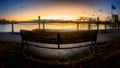 Pier's First Light and a Bench for Solitude Royalty Free Stock Photo