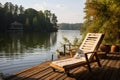 Pier serenity Wooden dock with lounge chair surrounded by forest Royalty Free Stock Photo