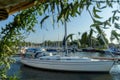 Pier speedboat. A marina lot. This is usually the most popular tourist attractions on the beach.Yacht and sailboat is moored at