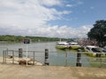 pier with speedboats with title