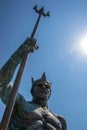 Pier with statue of Poseidon or Neptune, close-up, blue sea and sky, summertime, monument made from bronze Royalty Free Stock Photo