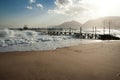 Pier in stormy seas, Nuweiba Egypt Royalty Free Stock Photo